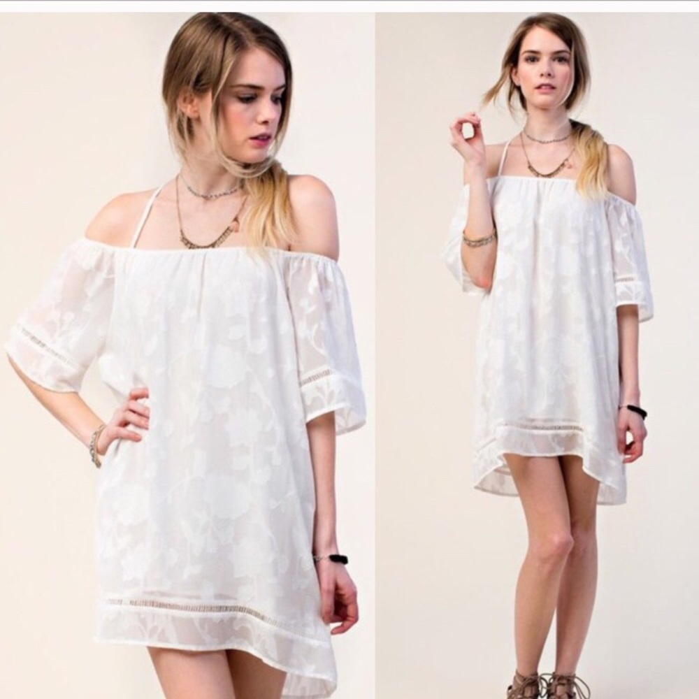 Hi Lo cold shoulder lined white dress. NWT